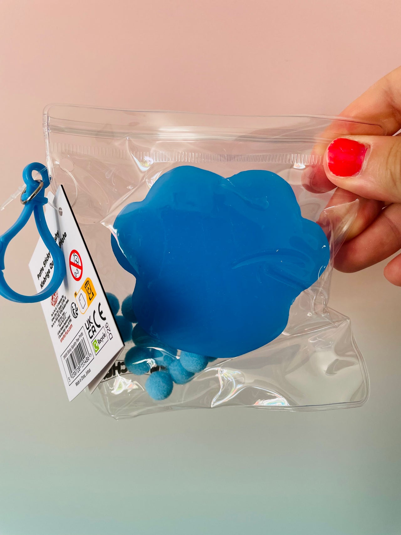 Back view of Blue Scrunchems Sticky Squishy Paw Print sensory toy