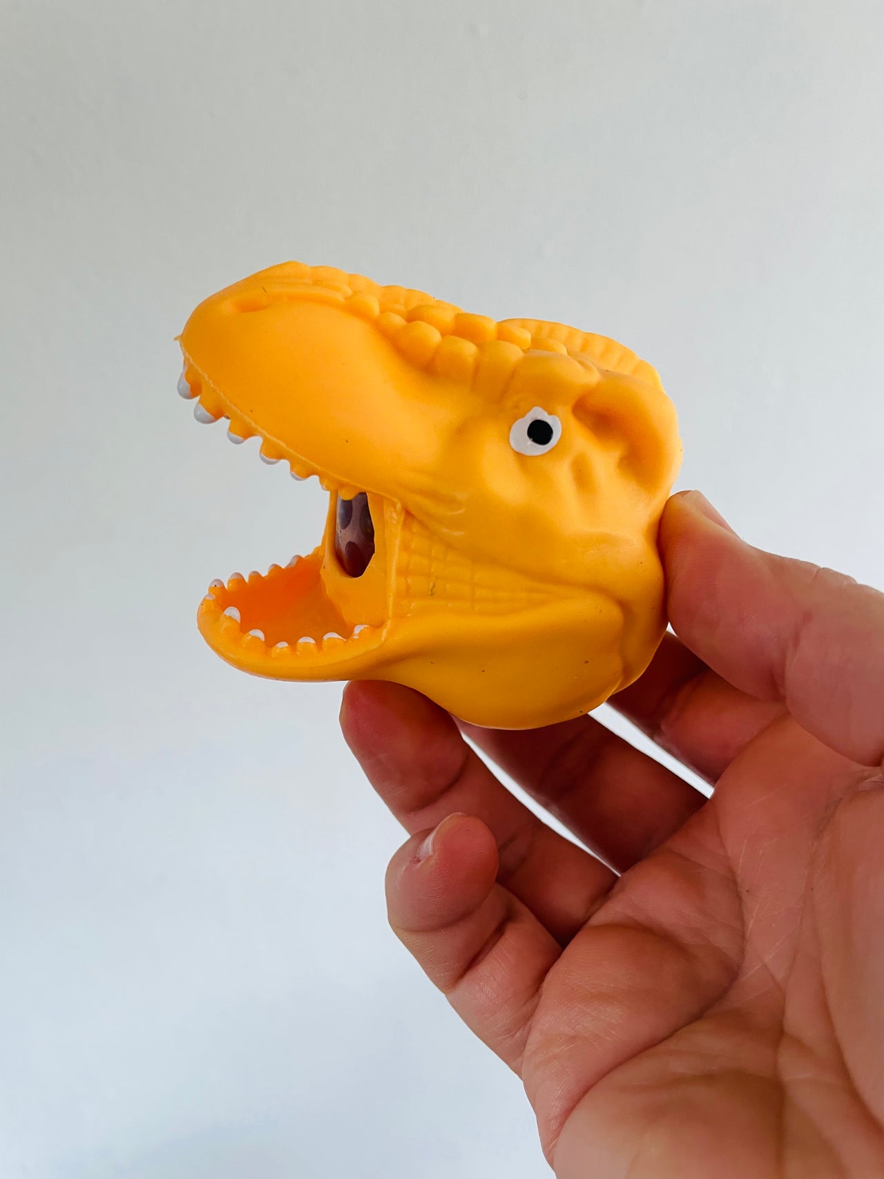 🦖🧡 Orange Dinosaur Head Bead Squeeze Toy