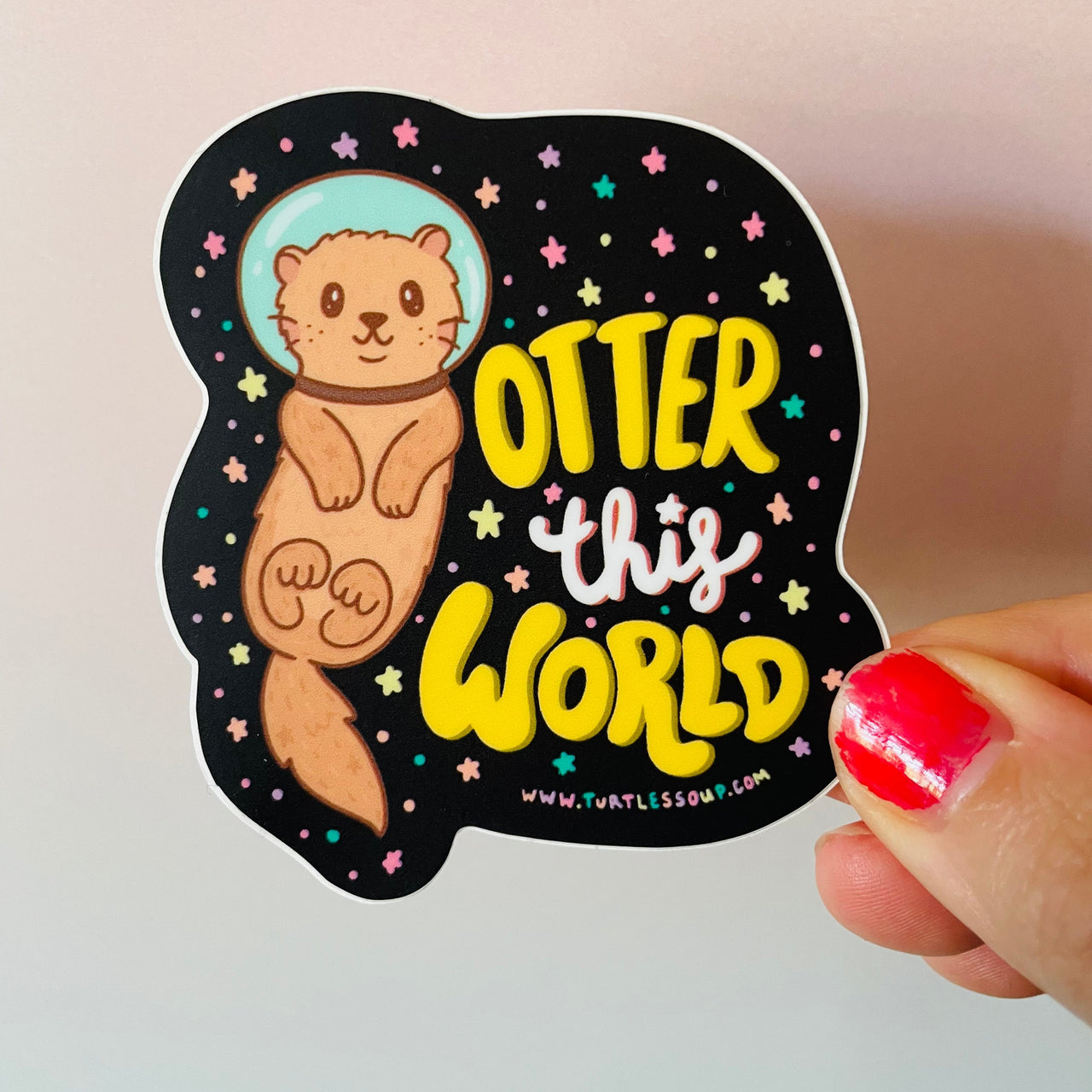 Otter This World Galaxy waterproof vinyl sticker featuring a cute astronaut otter