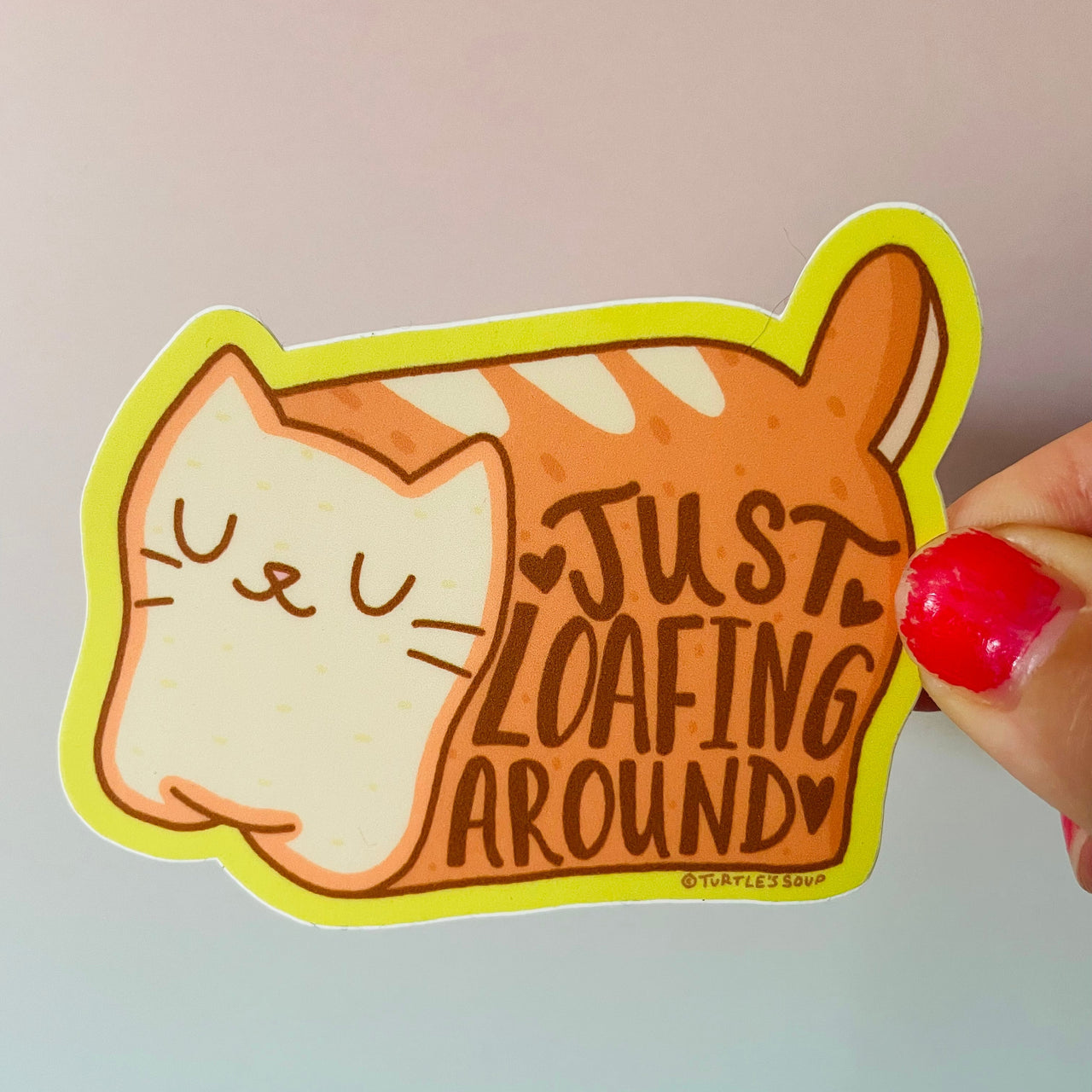 Just Loafing Around Kitty waterproof vinyl sticker featuring a cute cat loaf