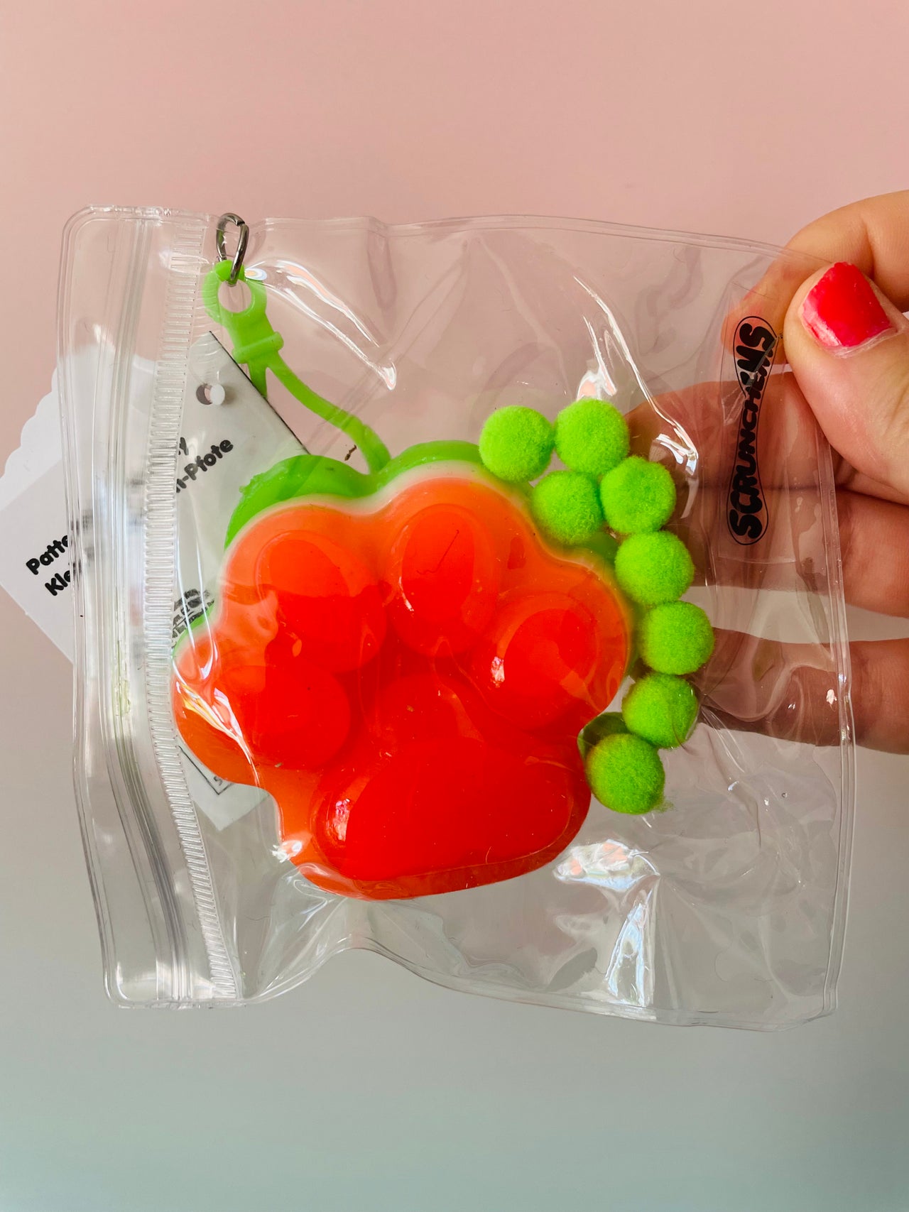 Green and Orange Scrunchems Sticky Squishy Paw Print sensory fidget toy