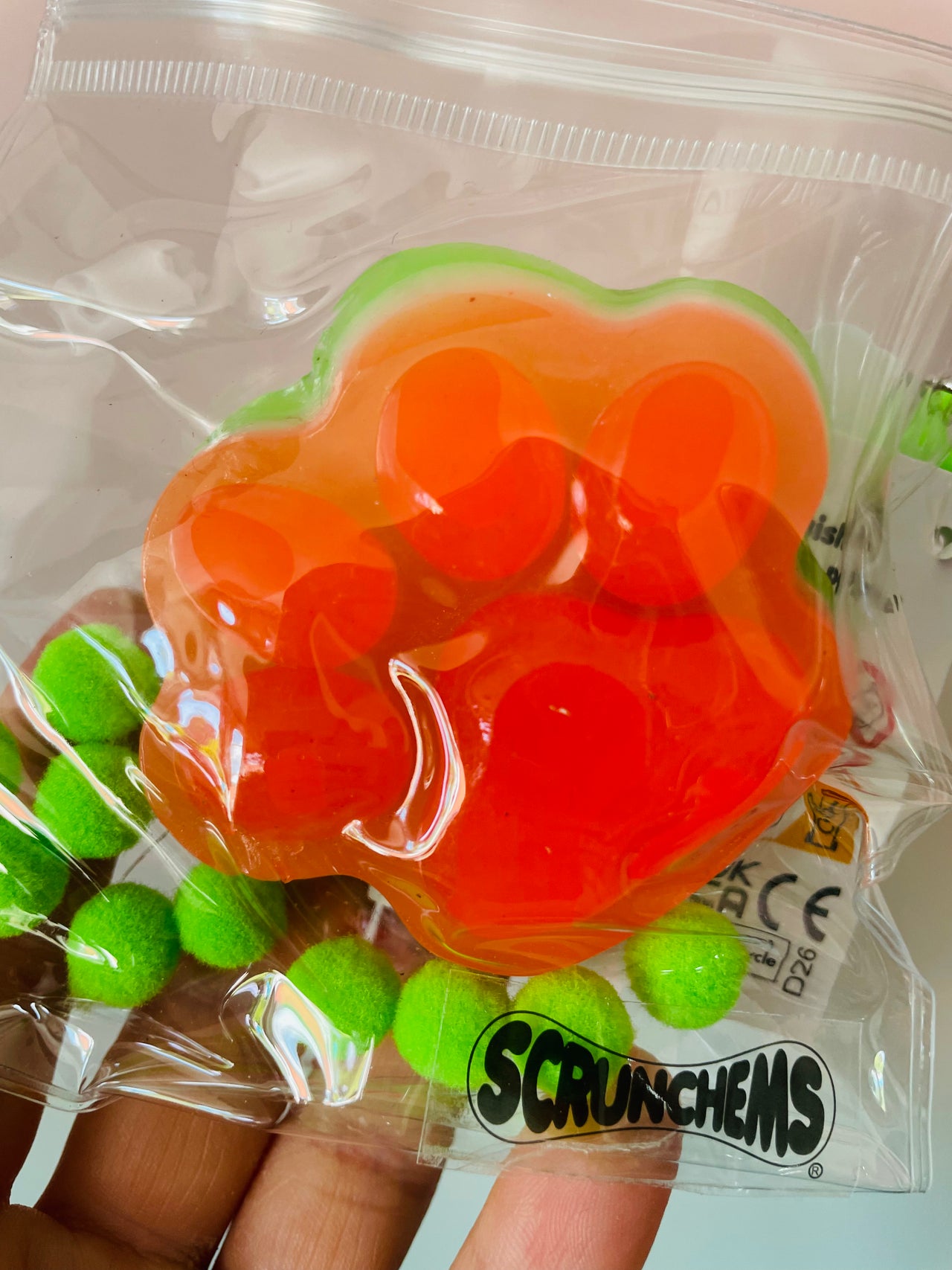 Green and Orange Scrunchems Sticky Squishy Paw Print sensory fidget toy