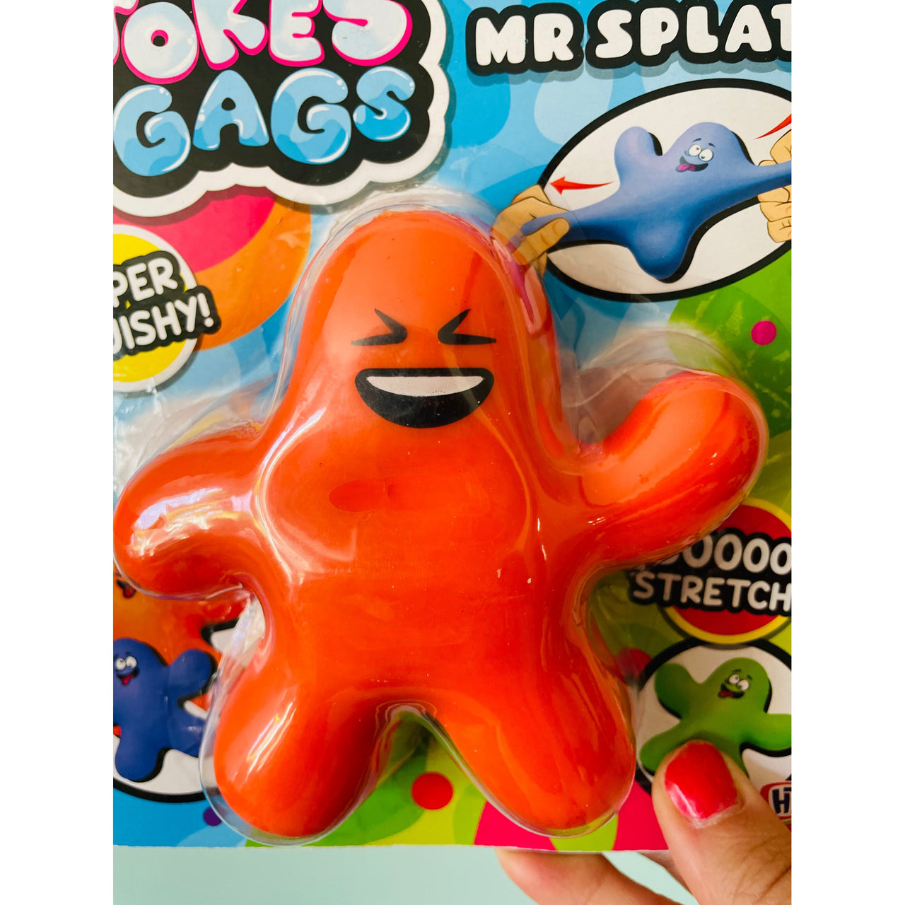 Close-up of Orange Mr Splat! stretchy squishy toy