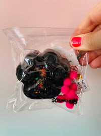Black Scrunchems Sticky Squishy Paw Print sensory fidget toy