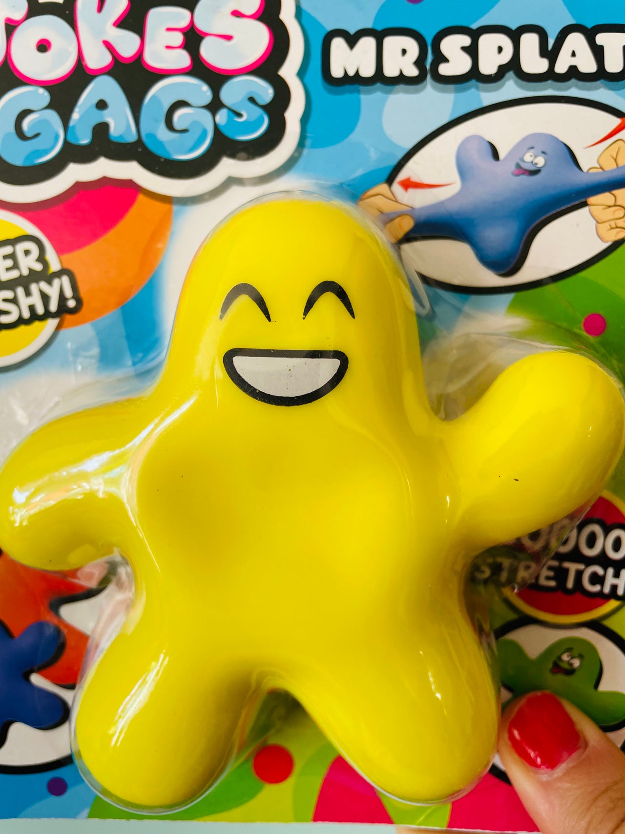 Close-up of Yellow Mr Splat! stretchy squishy toy