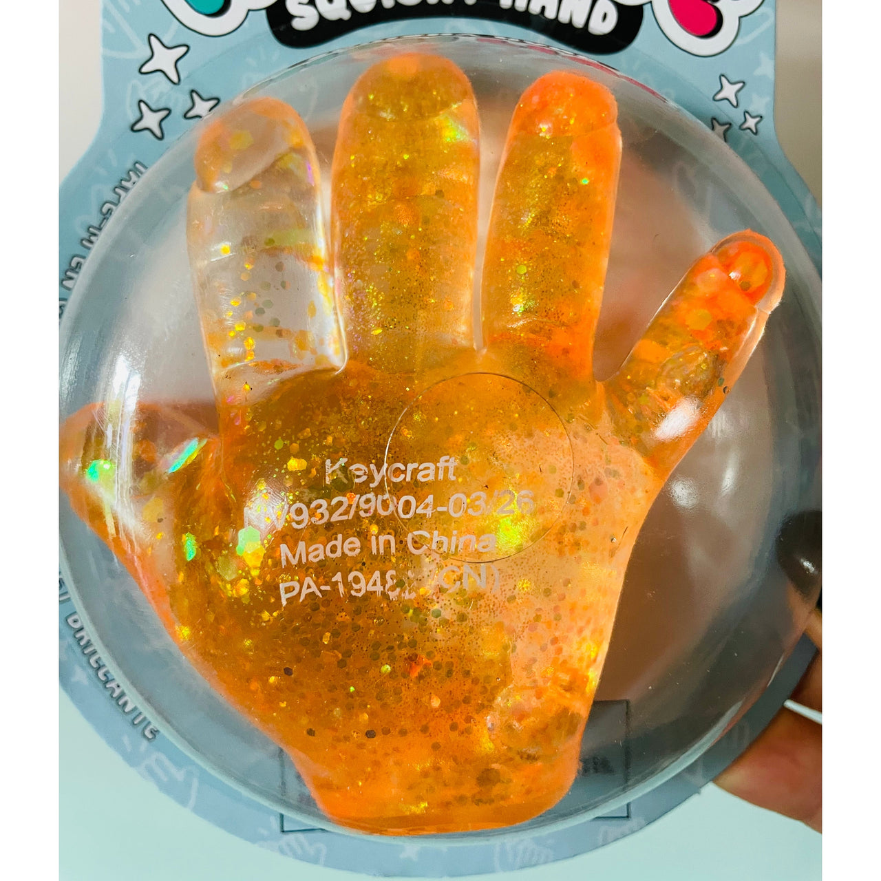 Orange Sparkly Squishy High Five Hand sensory toy UK