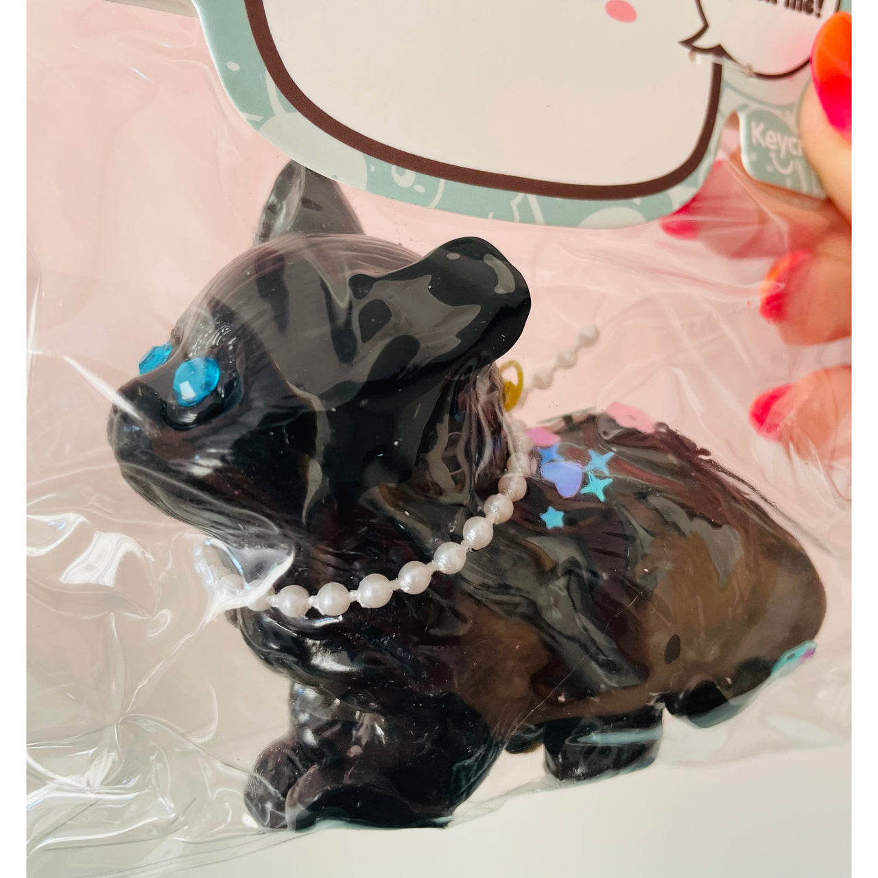 Jelli Squishy Pets Taba Black Cat Squishy Toy by Keycraft UK Close up with the cat's blue eyes